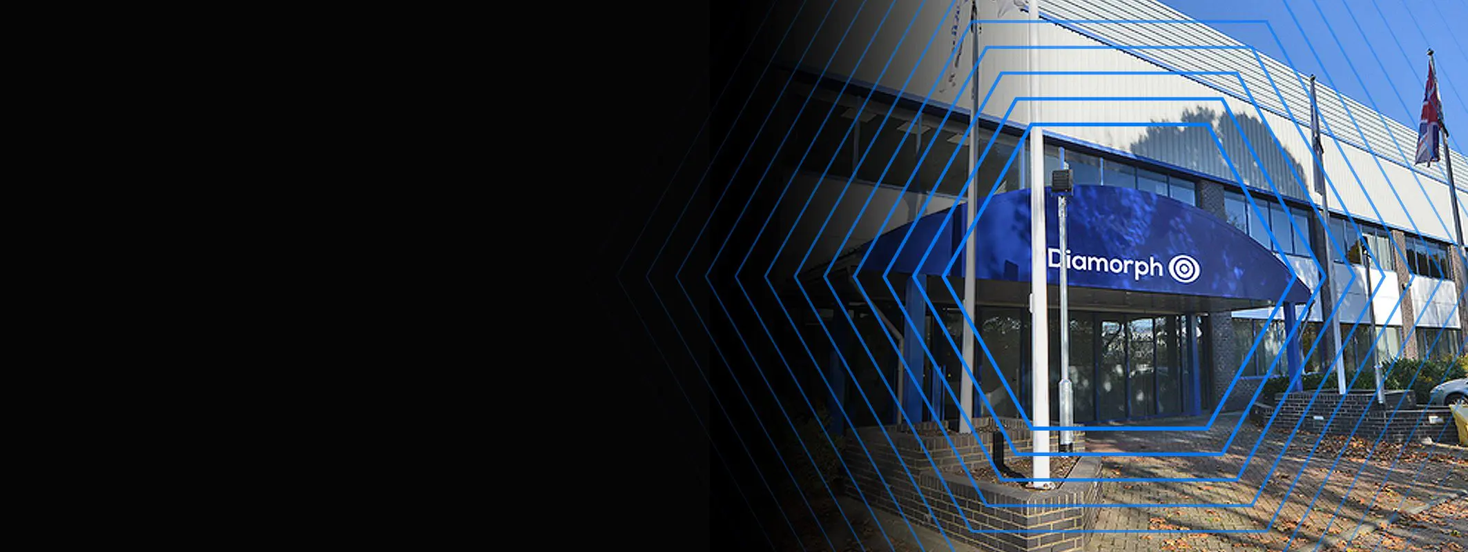 Blue Diamorph canopy at entrance of a modern building, with geometric blue lines overlay.