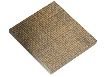 Square piece of brown textured material with a grid-like pattern, viewed from a slight angle.