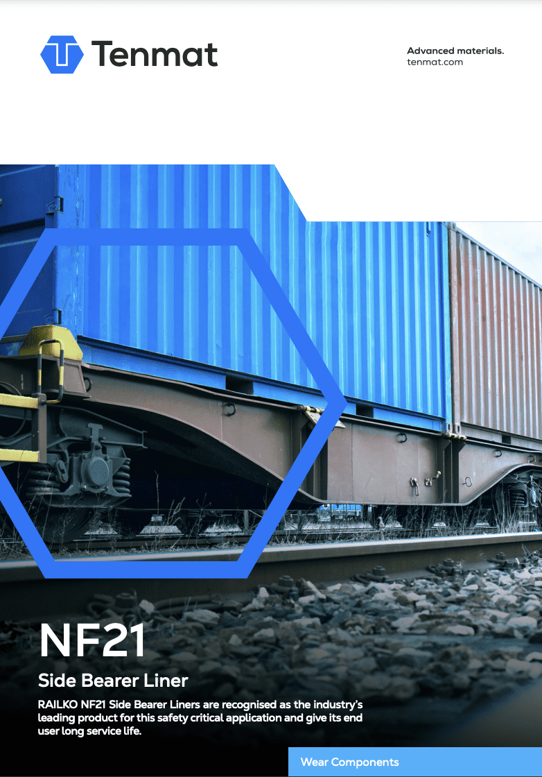 A close-up of a trains wheel and railcar, with Tenmat branding and text about NF21 side bearer liners.