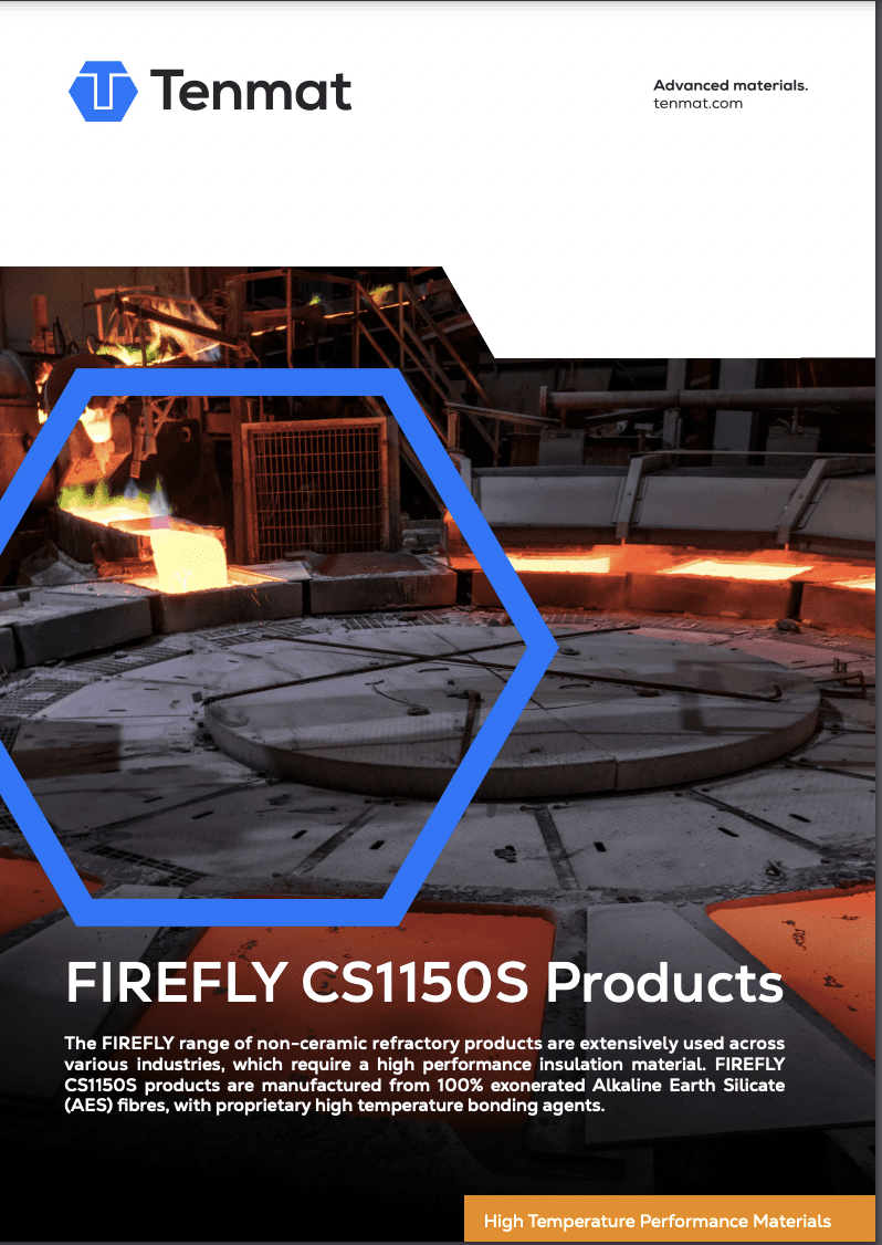A large industrial furnace glows orange, surrounded by insulation materials in a factory setting.