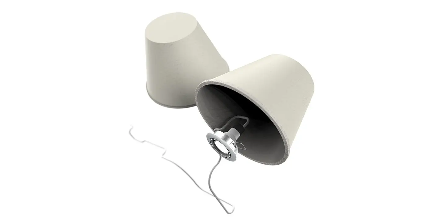 Two white paper cups connected by a string, resembling a homemade toy telephone, on a white background.