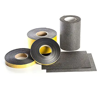 Rolls and sheets of black adhesive tape with yellow backing, displayed on a white surface.