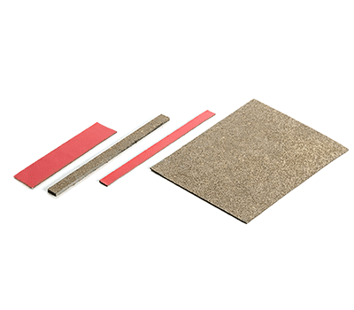 Four abrasive sanding blocks and sheets in various sizes on a white background.