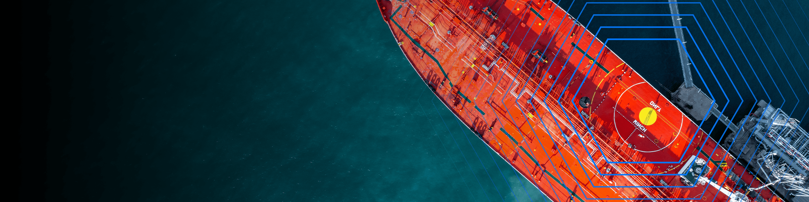 Aerial view of a red cargo ship at sea with blue digital lines overlaying part of the vessel.