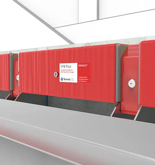 Red fire barrier system labeled VFB Plus installed between metal panels in a building structure.