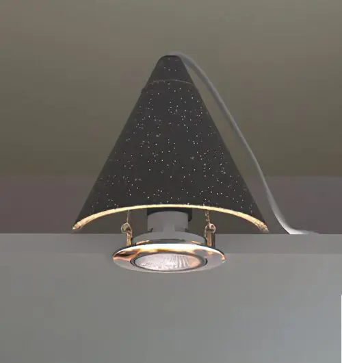 A black, cone-shaped wall lamp with small star-like holes, mounted above a light-colored surface.