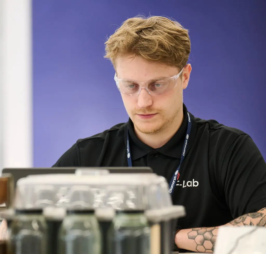 Man with safety goggles on.